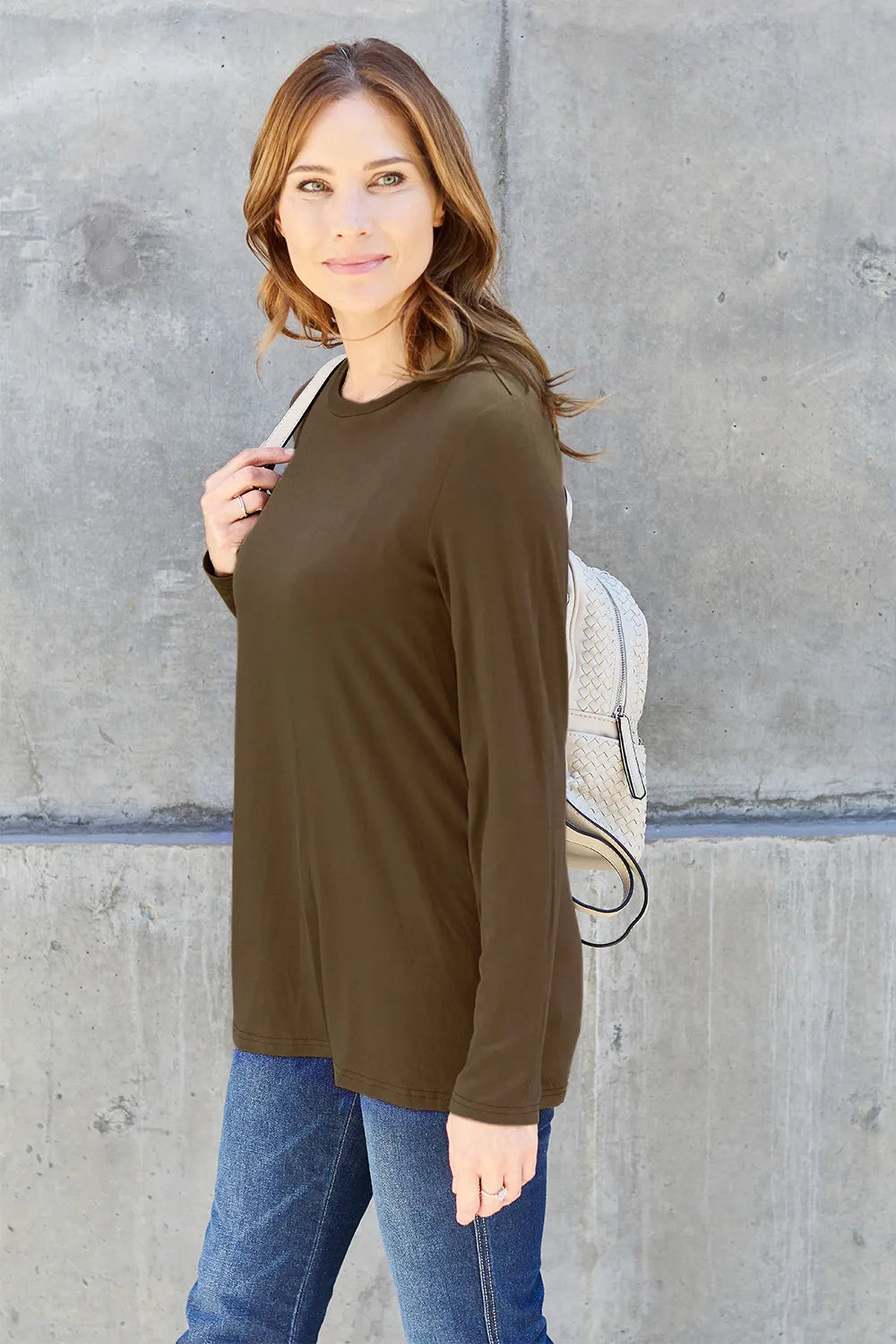 Crew neck long sleeve top with curved hem