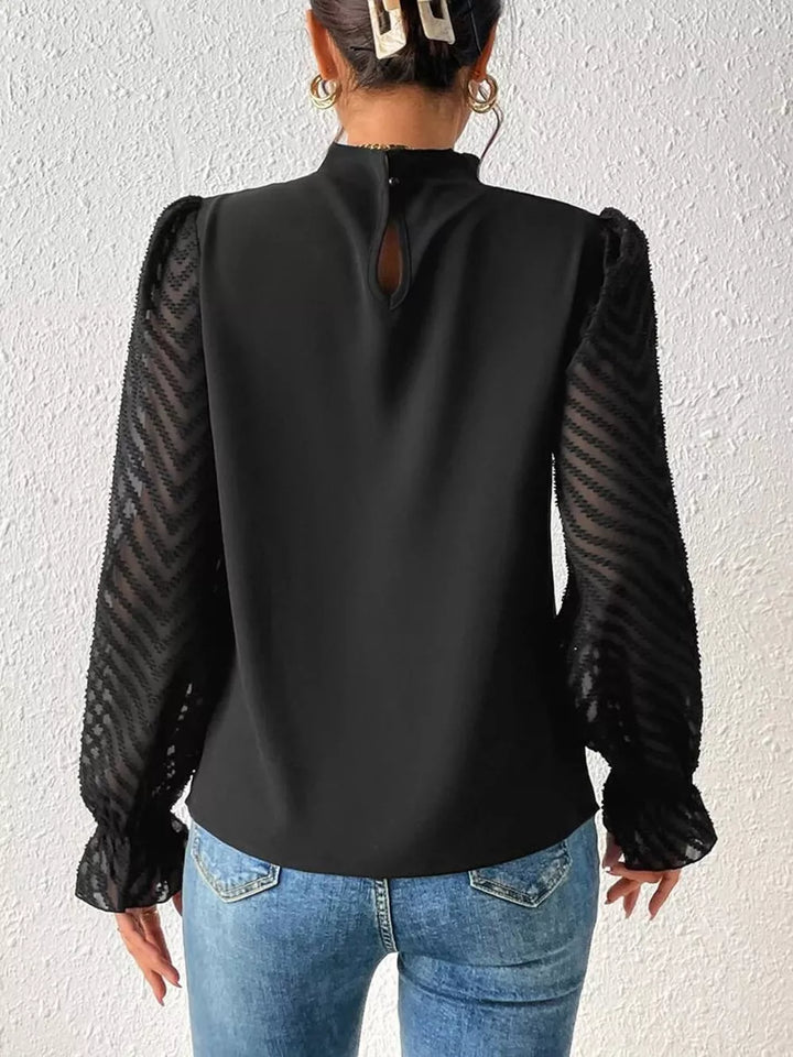 Mock neck blouse with sheer textured flounce sleeves