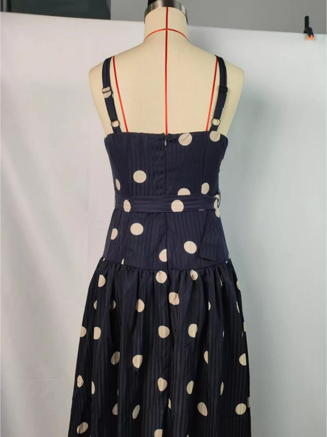 Polka dot sweetheart neck midi dress with belted waist