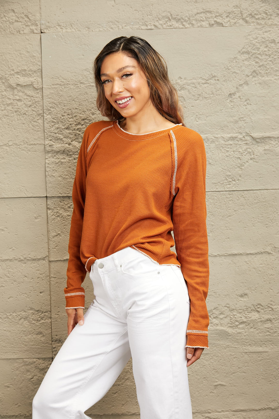 Waffle knit raglan sleeve top with ruffle cuffs