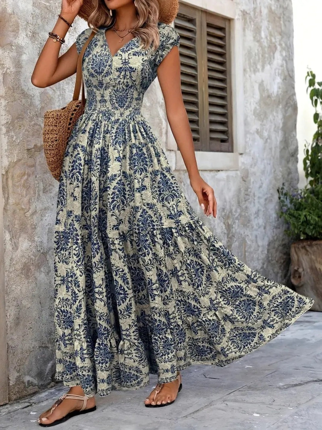 Smocked tiered maxi dress with cap sleeves and side slit