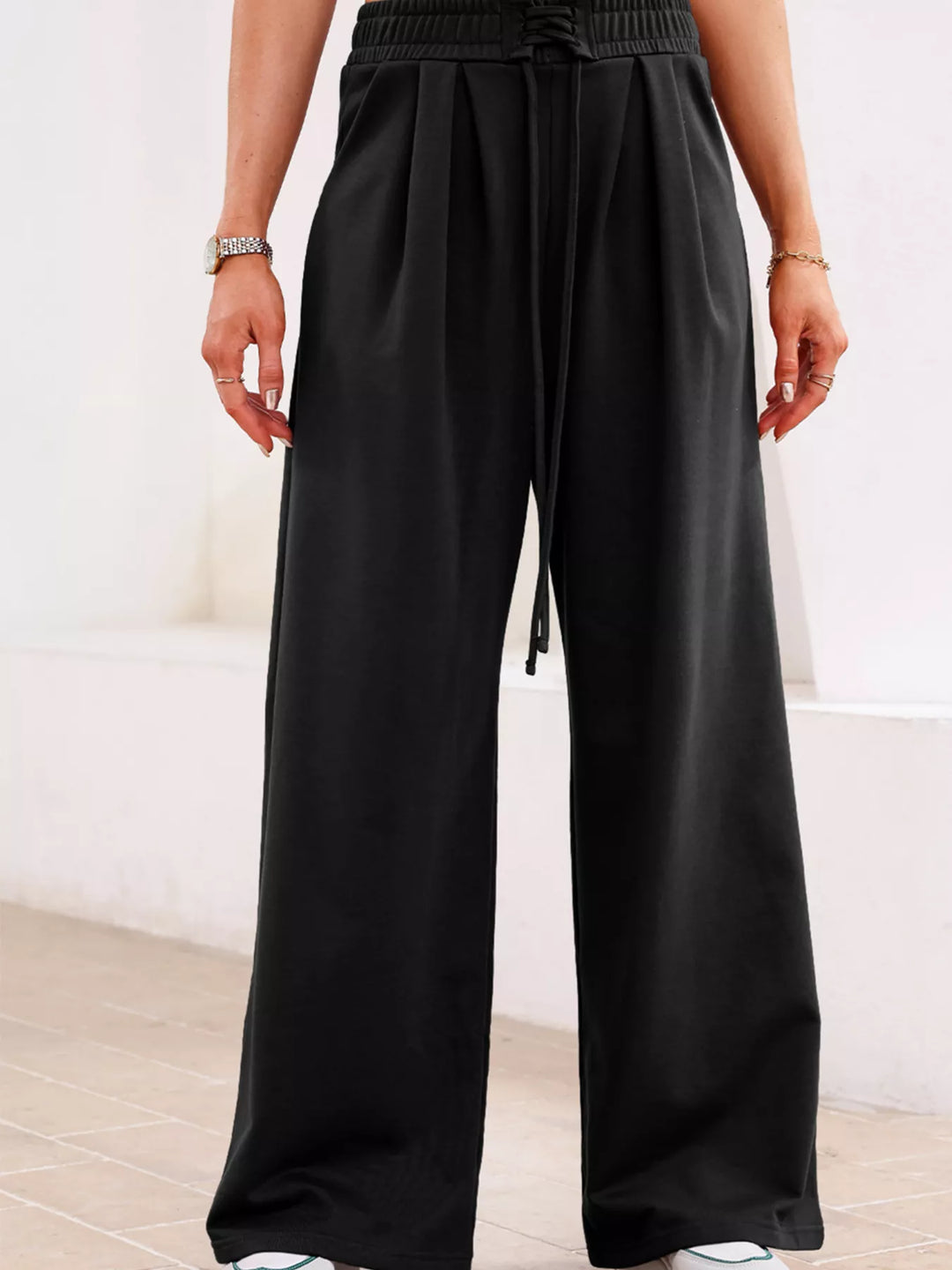 High-rise wide-leg pleated sweatpants with drawstring