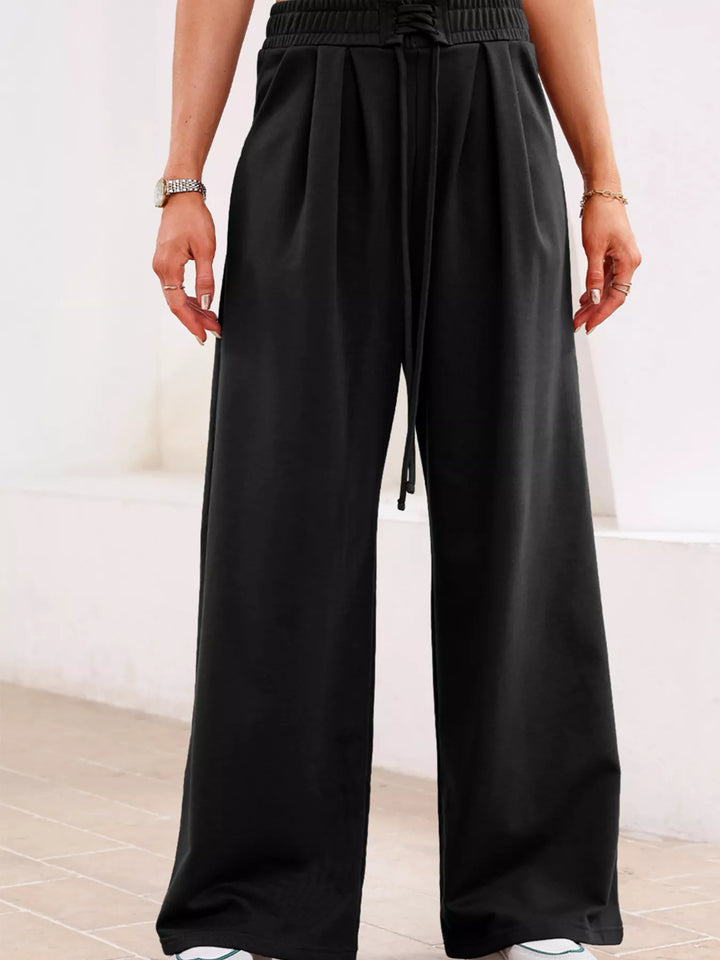 High-rise wide-leg pleated sweatpants with drawstring