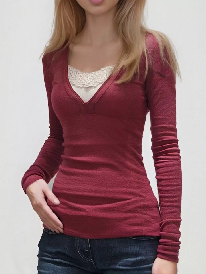 Long sleeve V-neck top with lace trim neckline