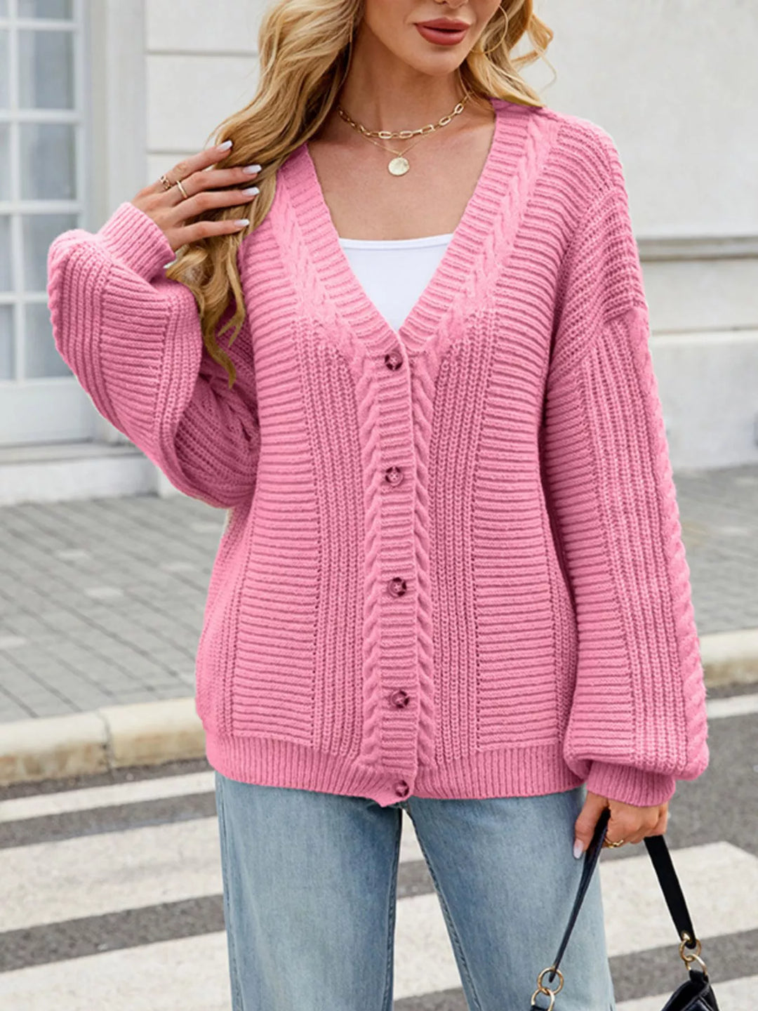 Pink Cable knit button-front cardigan with drop shoulder sleeves