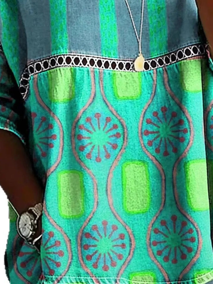 Floral print crochet-trim tunic top with 3/4 sleeves