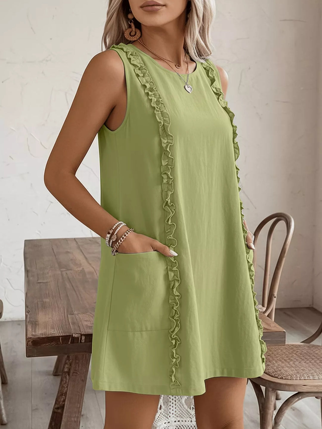 Ruffle-trim sleeveless mini dress with side pockets
