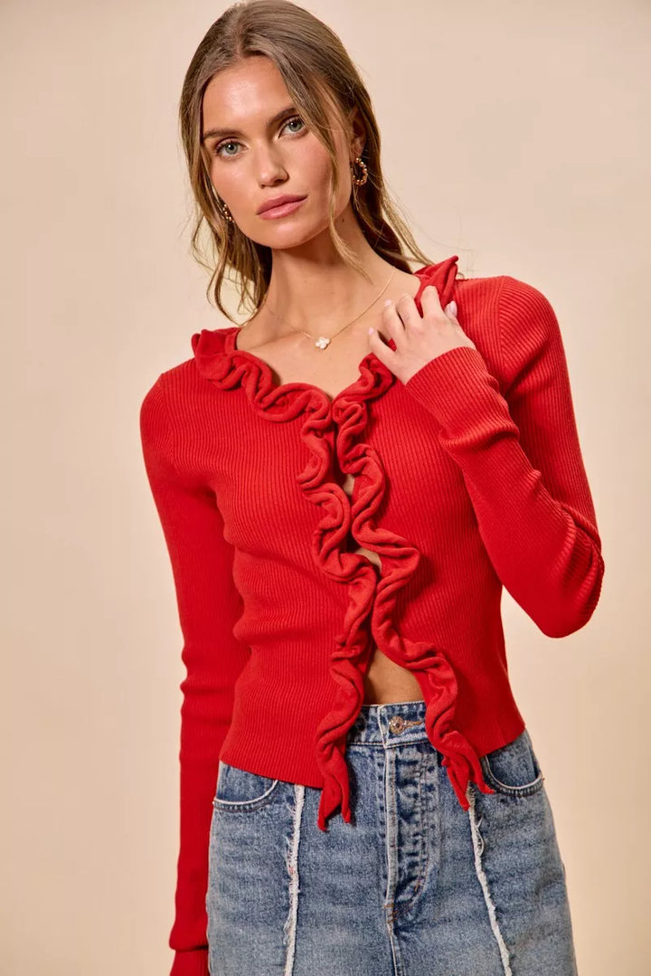 Ribbed knit cardigan with cascade ruffle trim