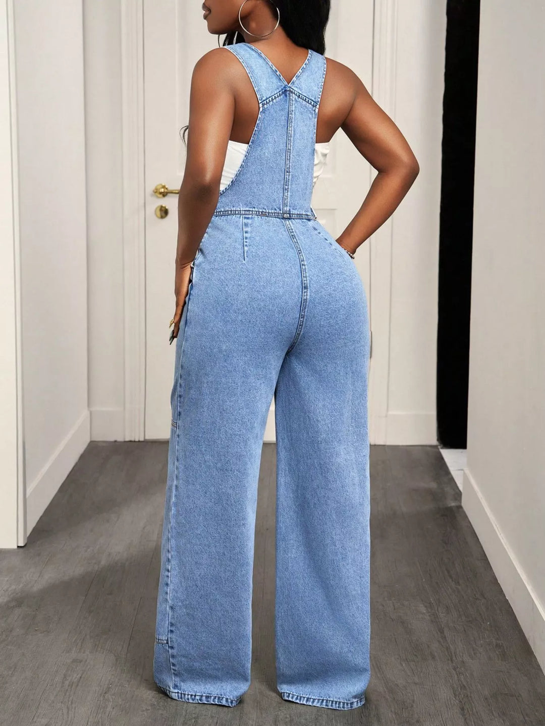 Wide leg denim overalls with bib pocket and side buttons