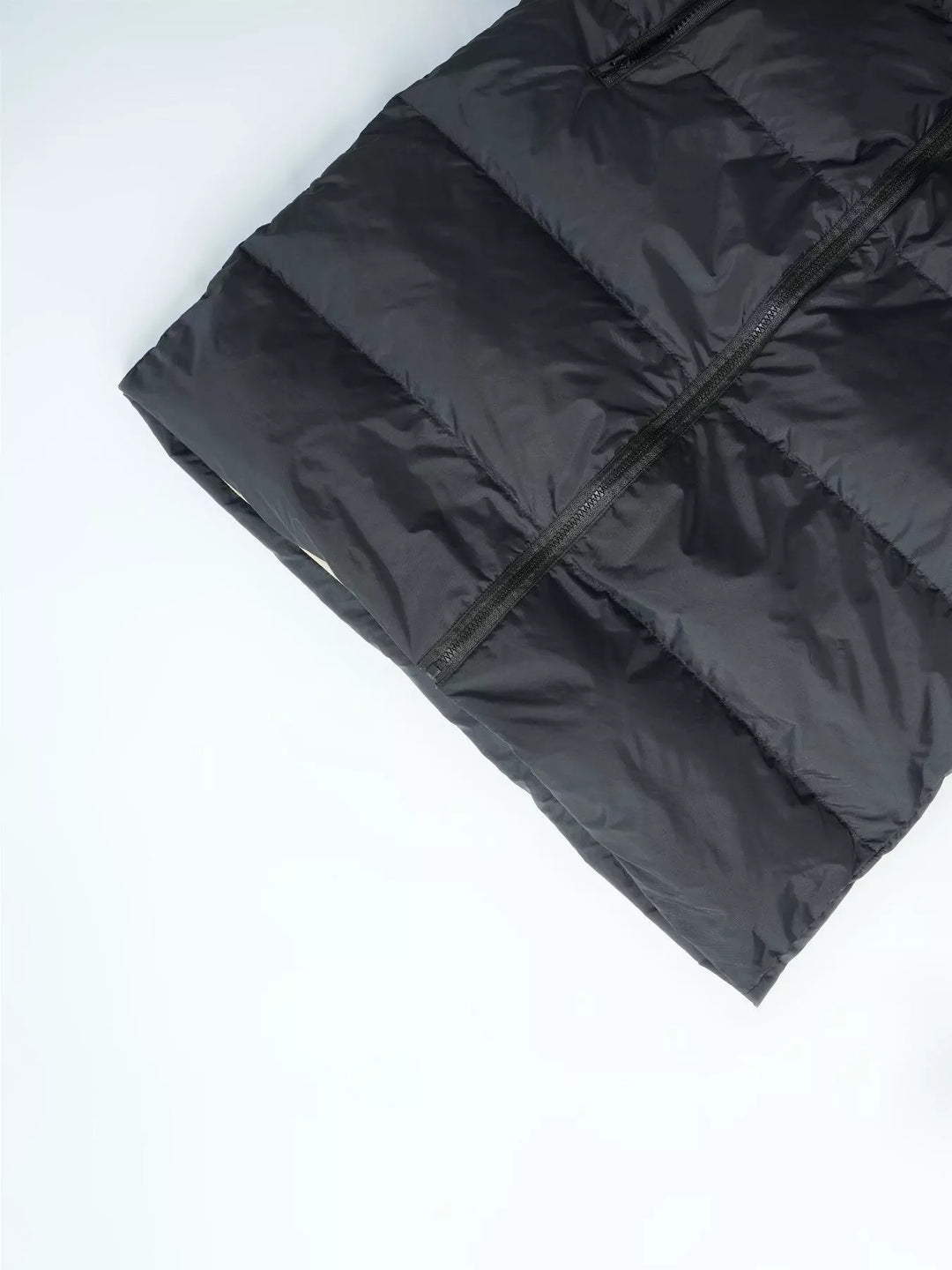 Longline hooded puffer vest with zip pockets