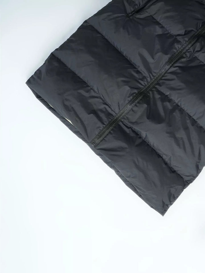 Longline hooded puffer vest with zip pockets
