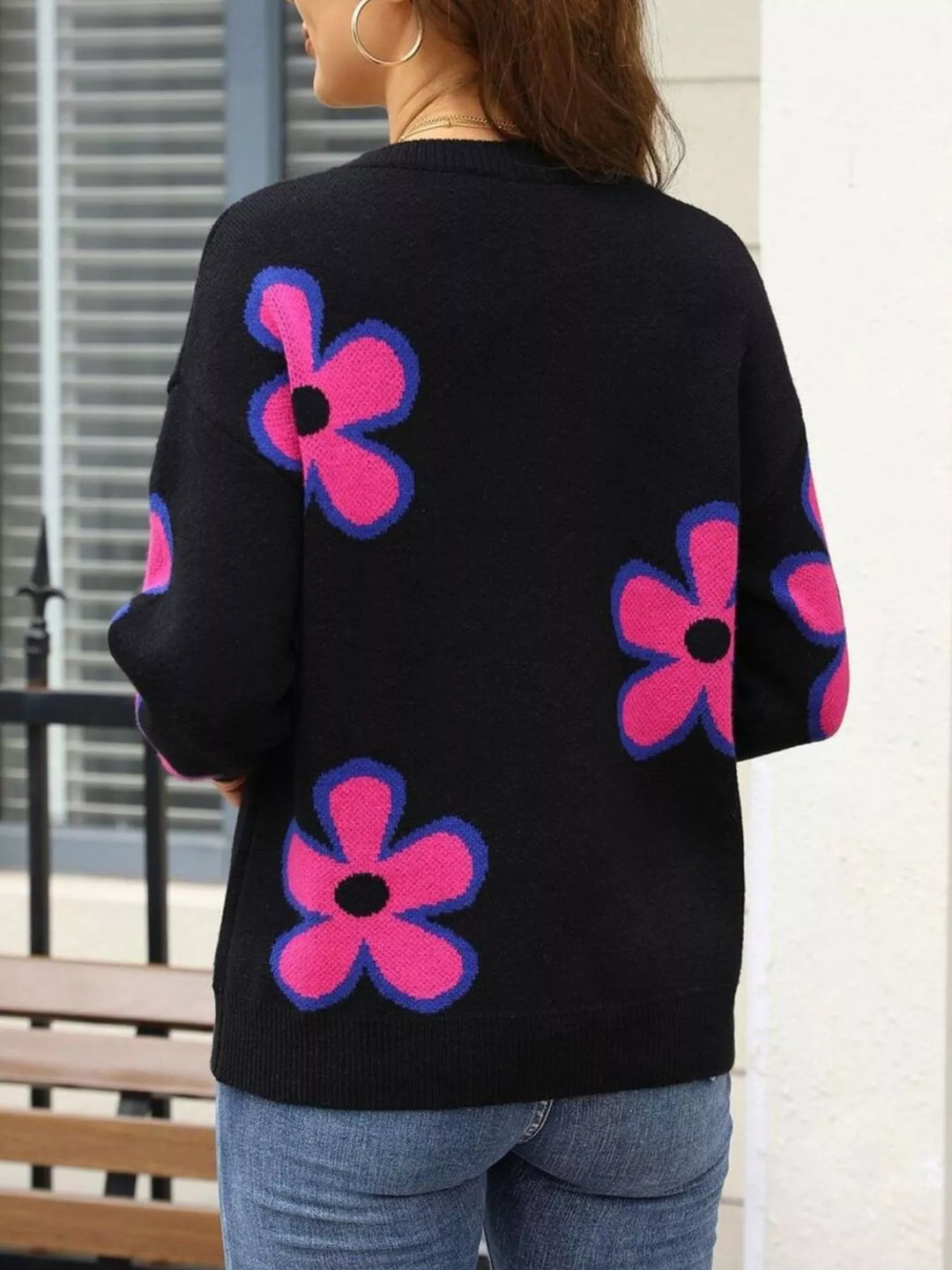 Floral crew neck knit sweater with ribbed cuffs