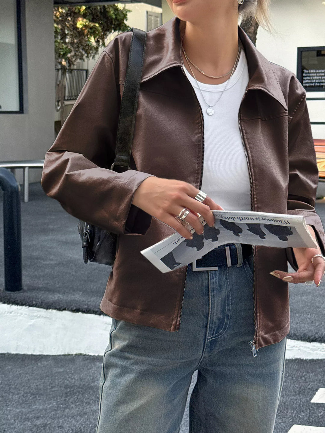 Collared faux leather zip-up jacket with patch pockets
