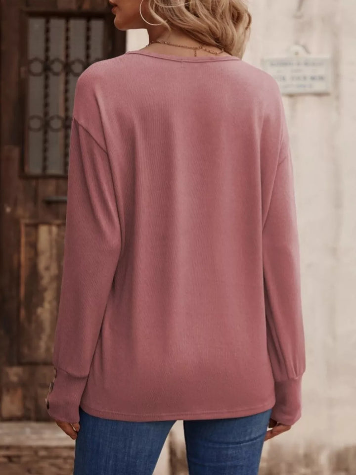 V-neck long sleeve top with button cuffs