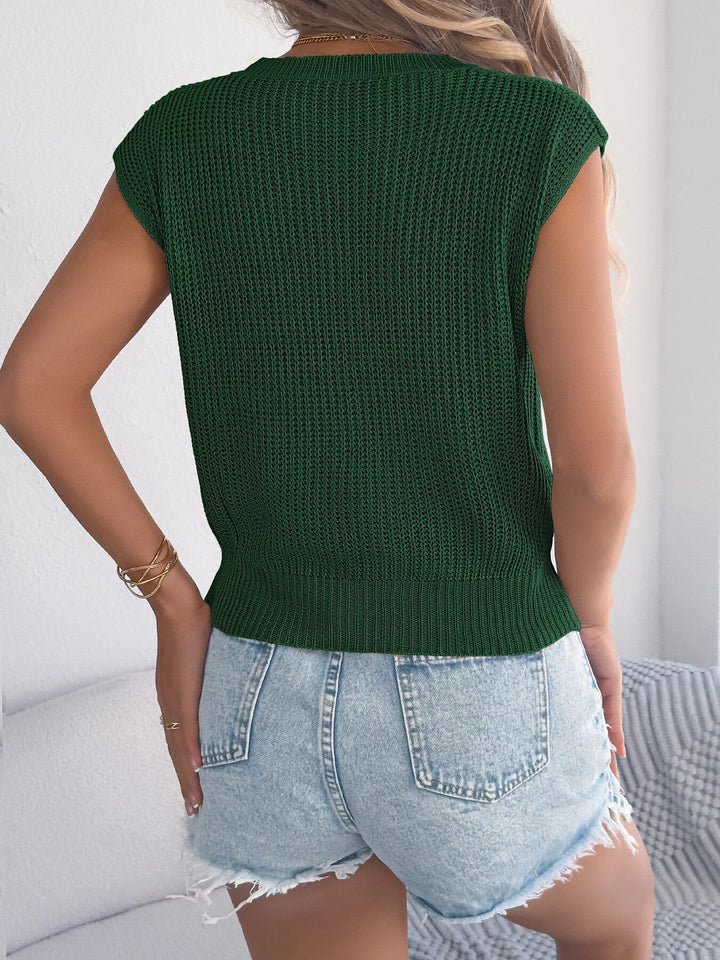 Cable knit cap sleeve sweater with ribbed hem