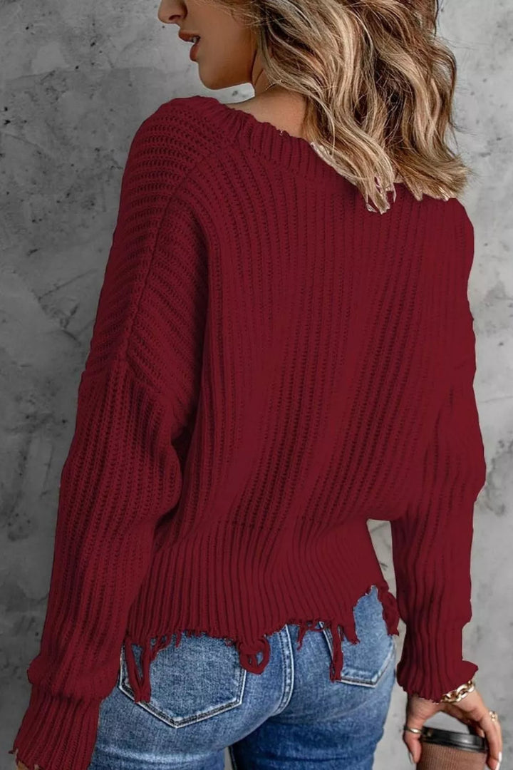 Distressed raw hem ribbed knit V-neck sweater
