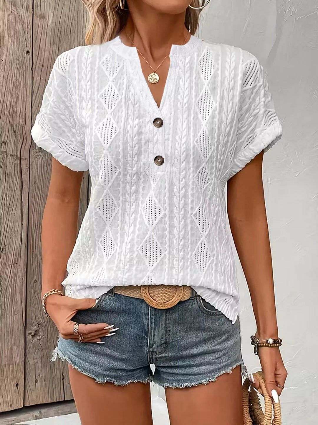 White Diamond pointelle knit split-neck top with buttons