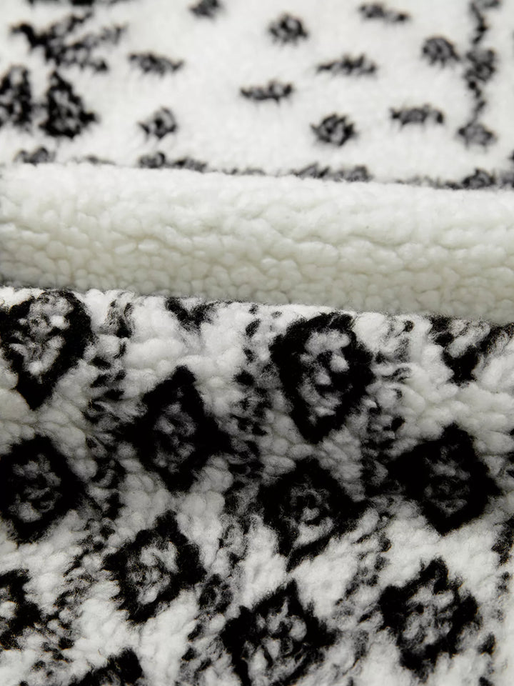 Open-front sherpa vest with paisley print and patch pockets