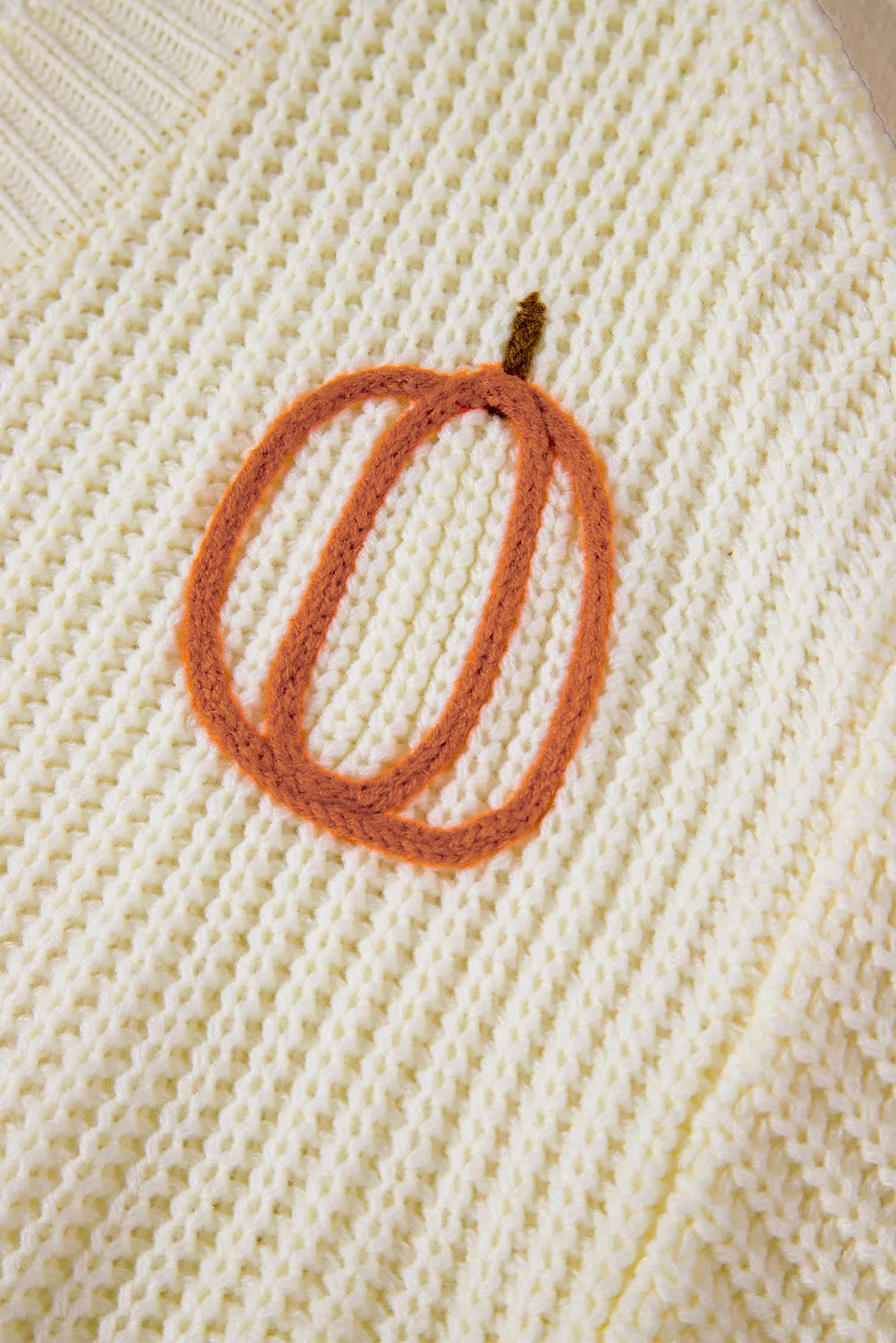 Pumpkin embroidered chunky knit sweater with frayed raw hem
