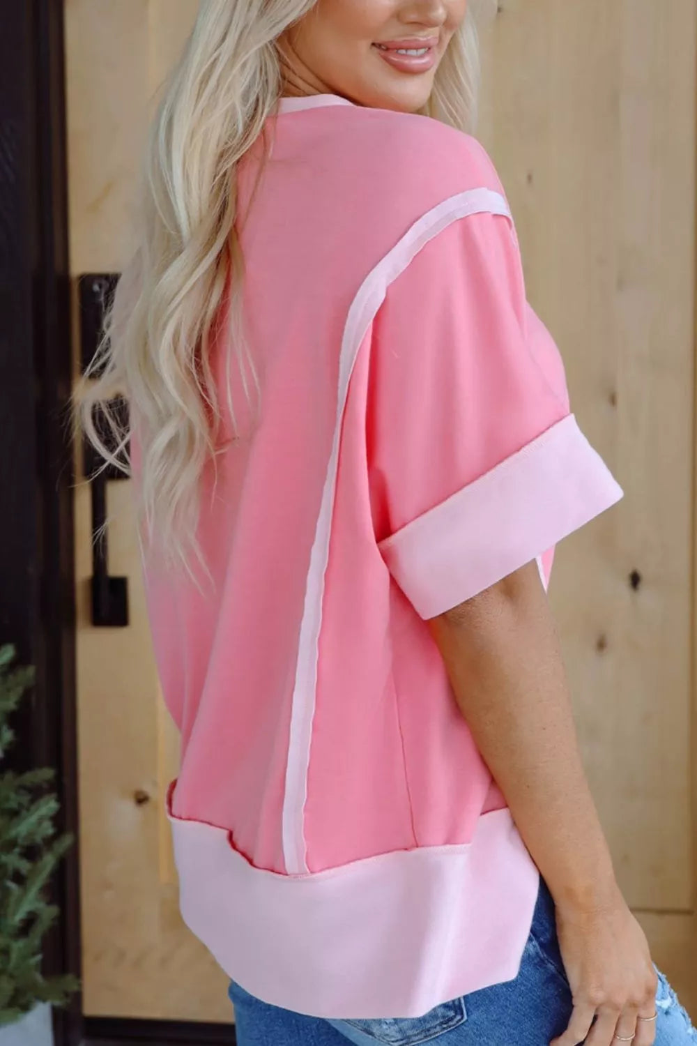 Sequin cherry and bow graphic raw seam crew neck top