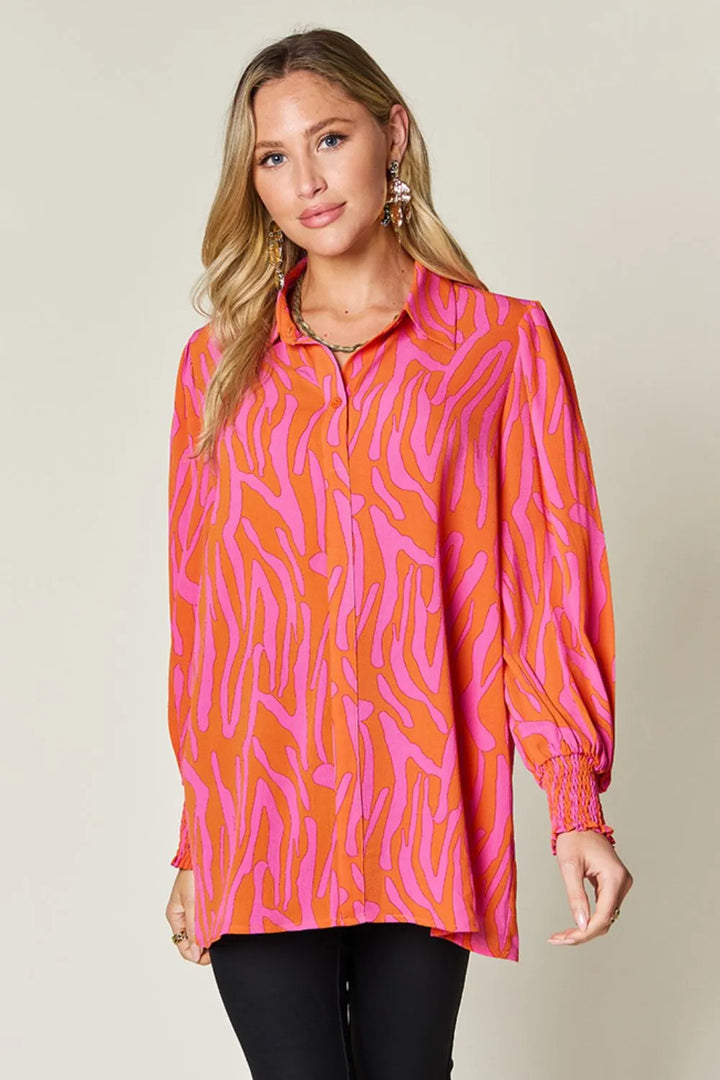 Orange Zebra print smocked-cuff long sleeve blouse