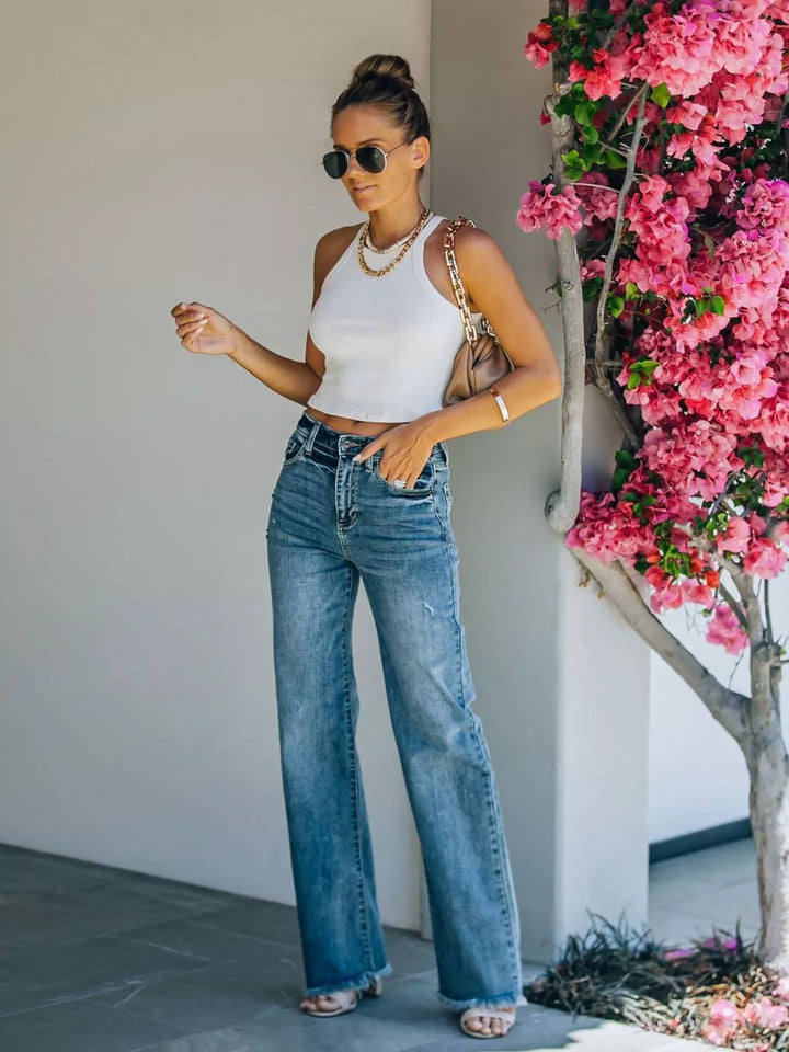 High-rise wide leg jeans with raw frayed hem