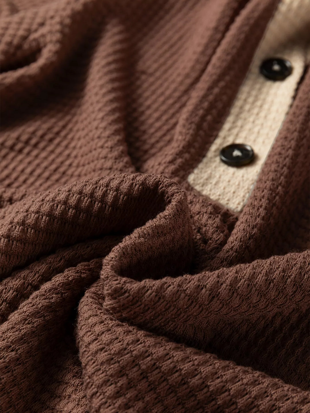 Waffle knit half-button hooded pullover with contrast trim