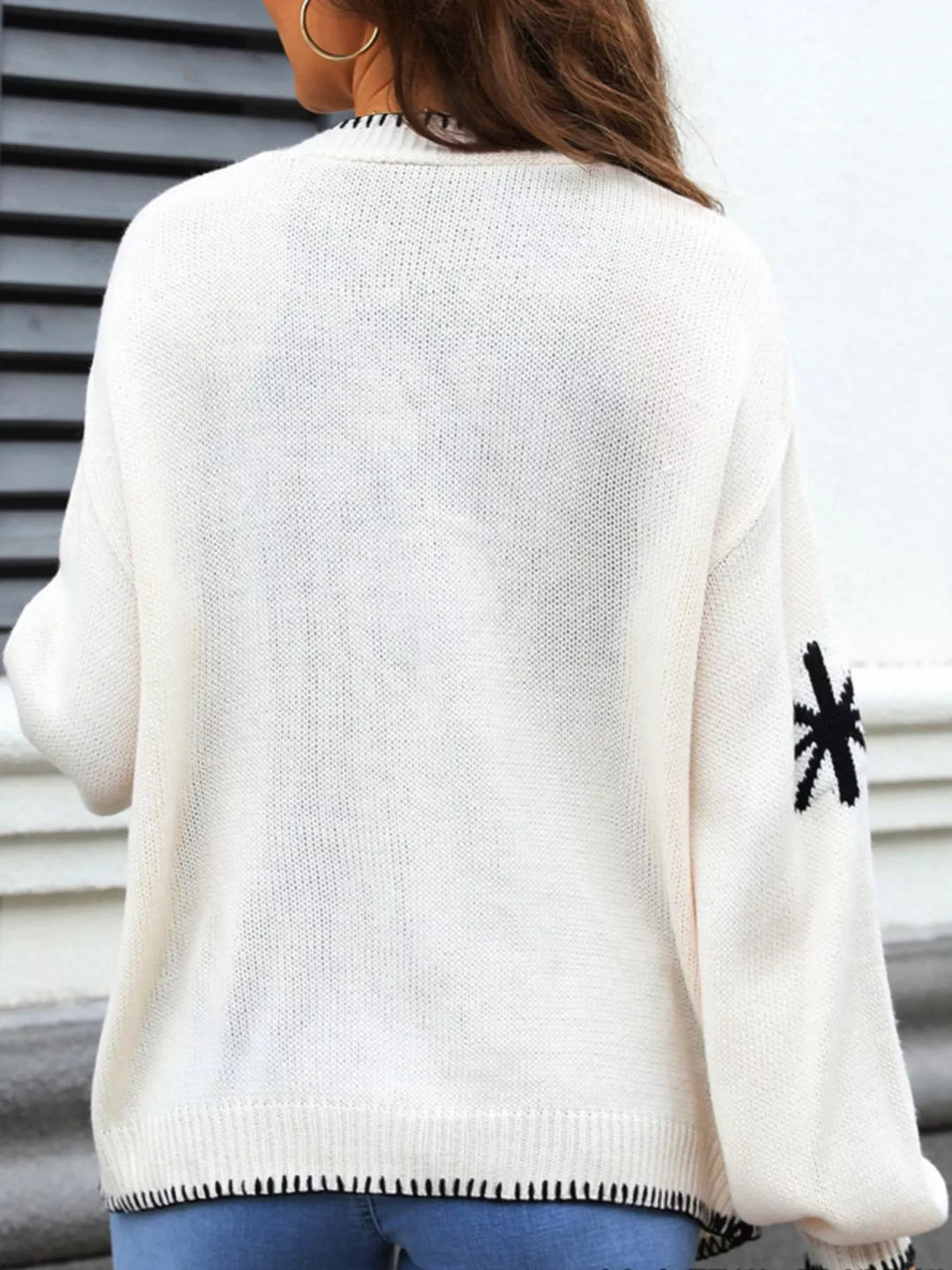 Floral open front knit cardigan with whipstitch trim