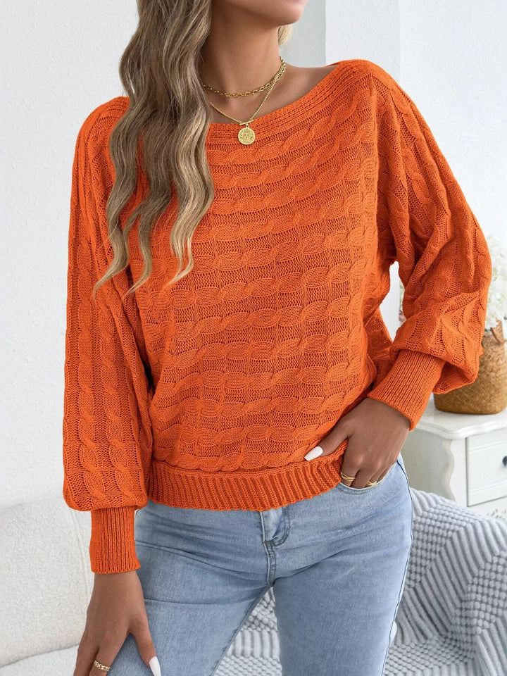 Cable knit boat neck sweater with dolman sleeves