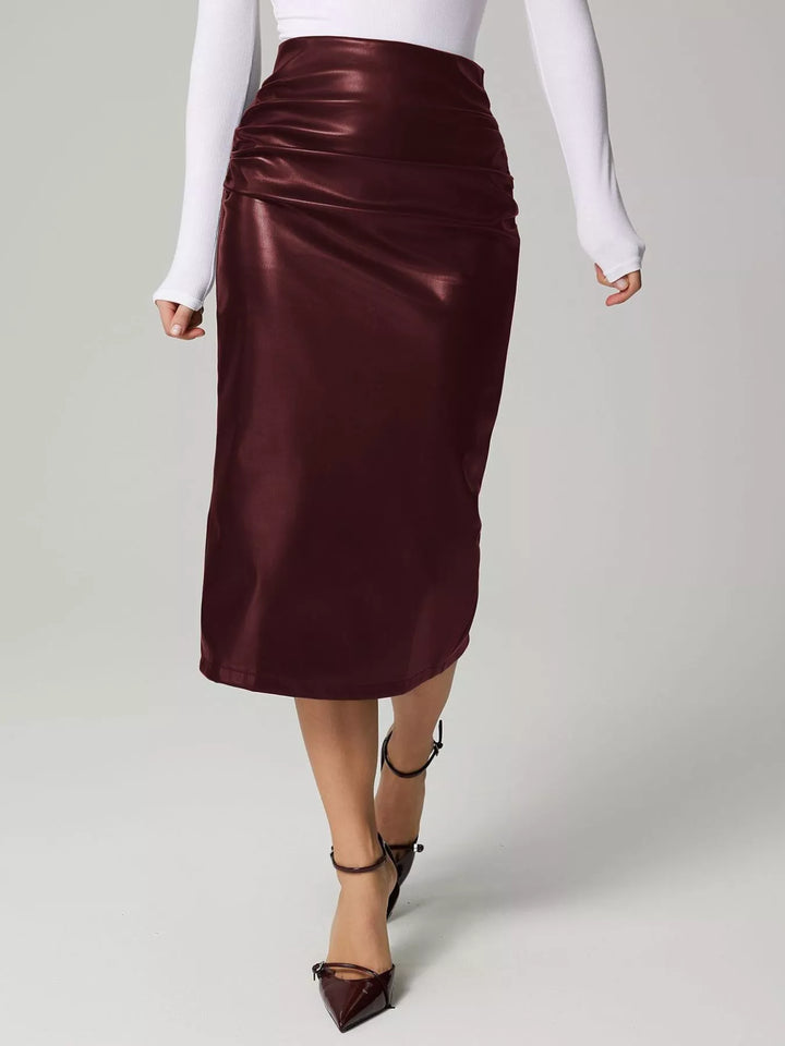 High-rise faux leather midi pencil skirt with back slit