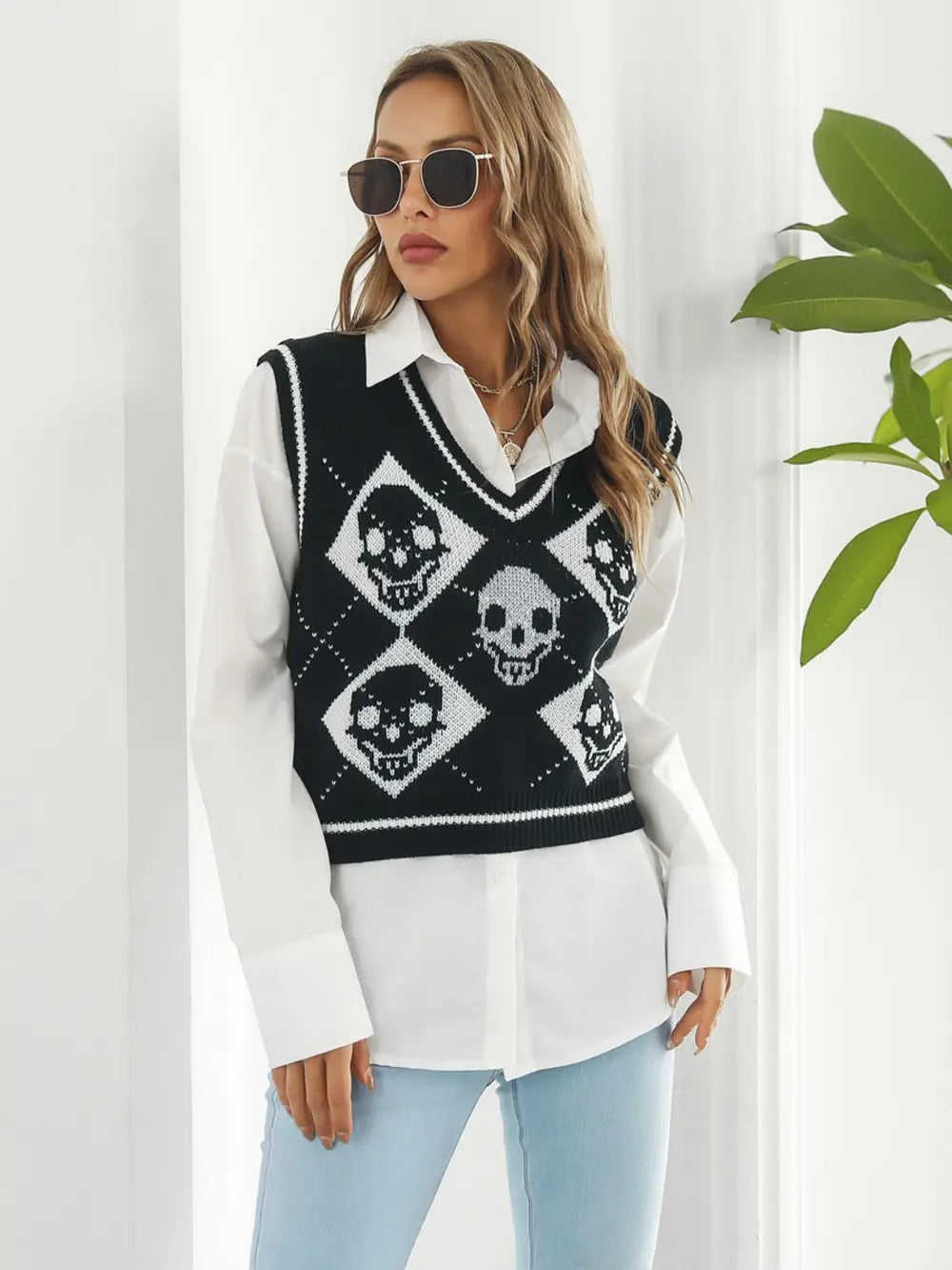 Skull argyle knit sweater vest with striped V-neck