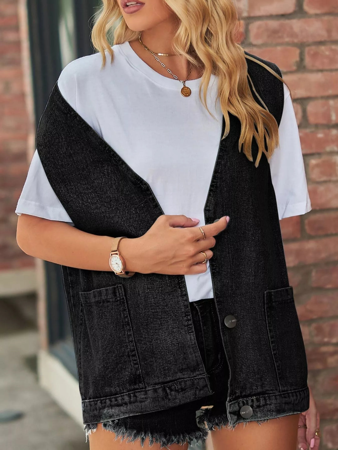 Sleeveless button-down denim vest with patch pockets