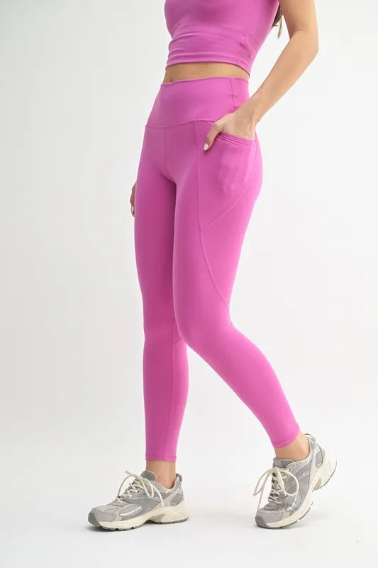 High-waisted sculpting leggings with side pockets