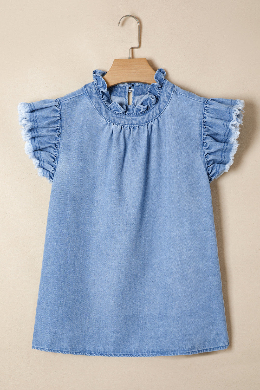 Frayed flutter sleeve denim top with frilled mock neck