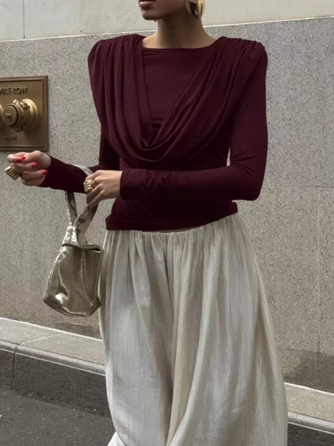 Draped cowl neck long sleeve top with ruched sides