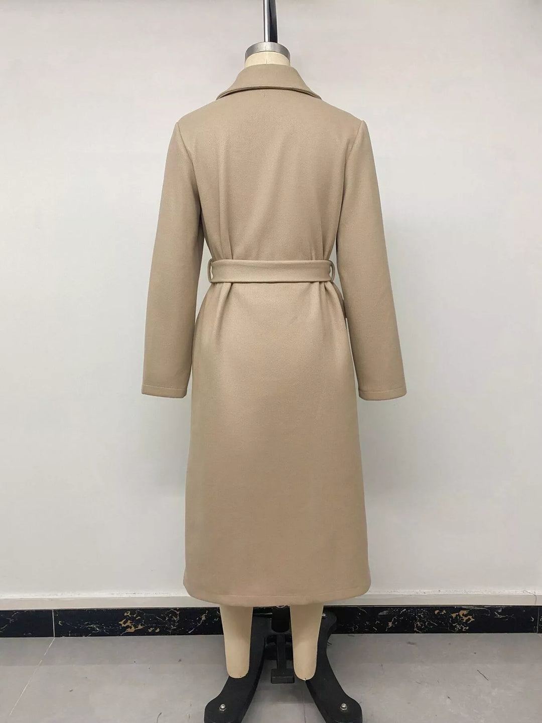 Double-breasted longline coat with notch lapel and tie belt