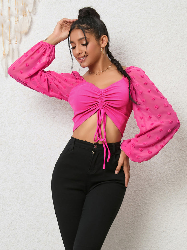 Ruched drawstring crop top with swiss dot sleeves