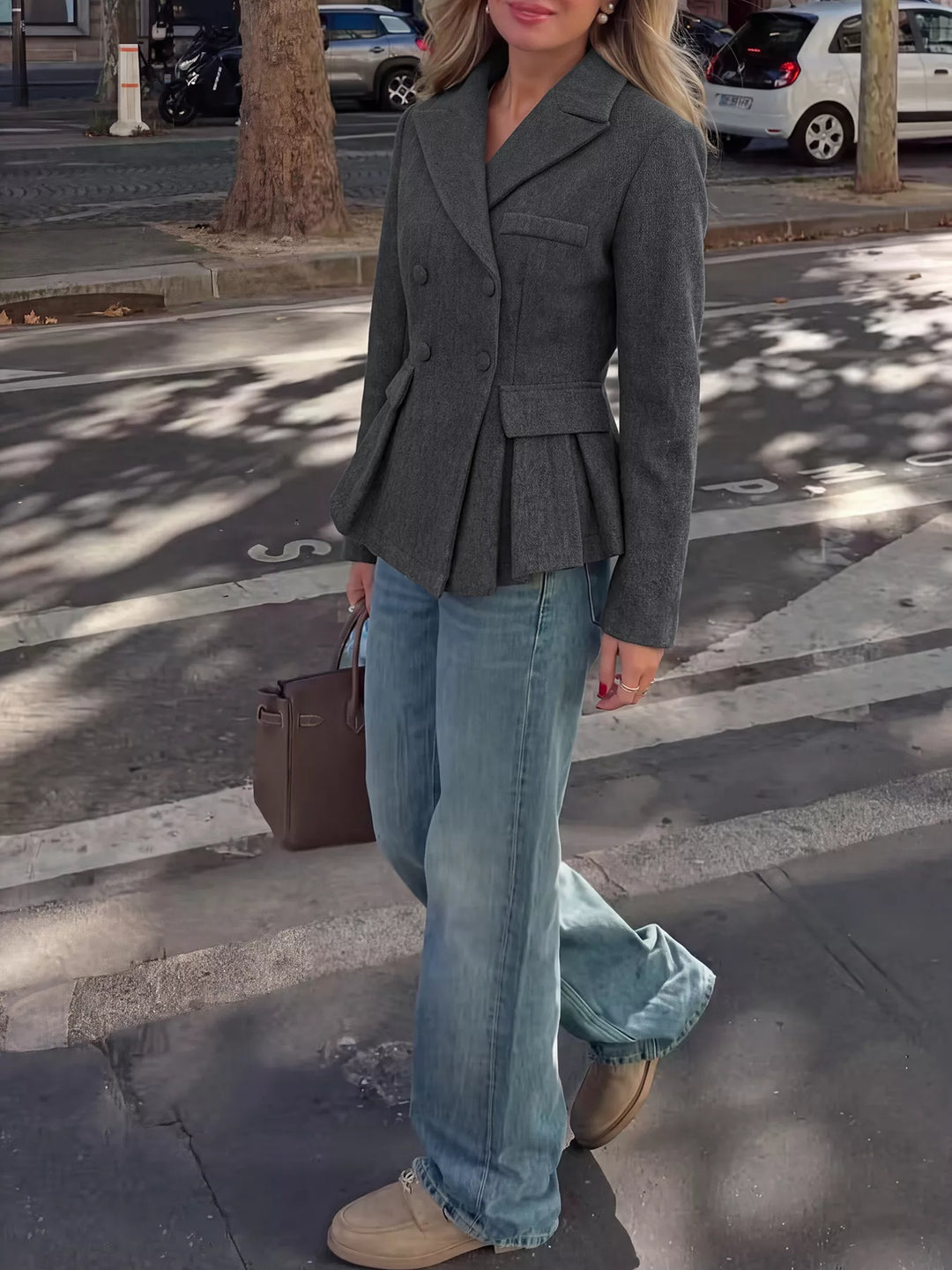 Double-breasted peplum blazer with notch lapel and flap pockets