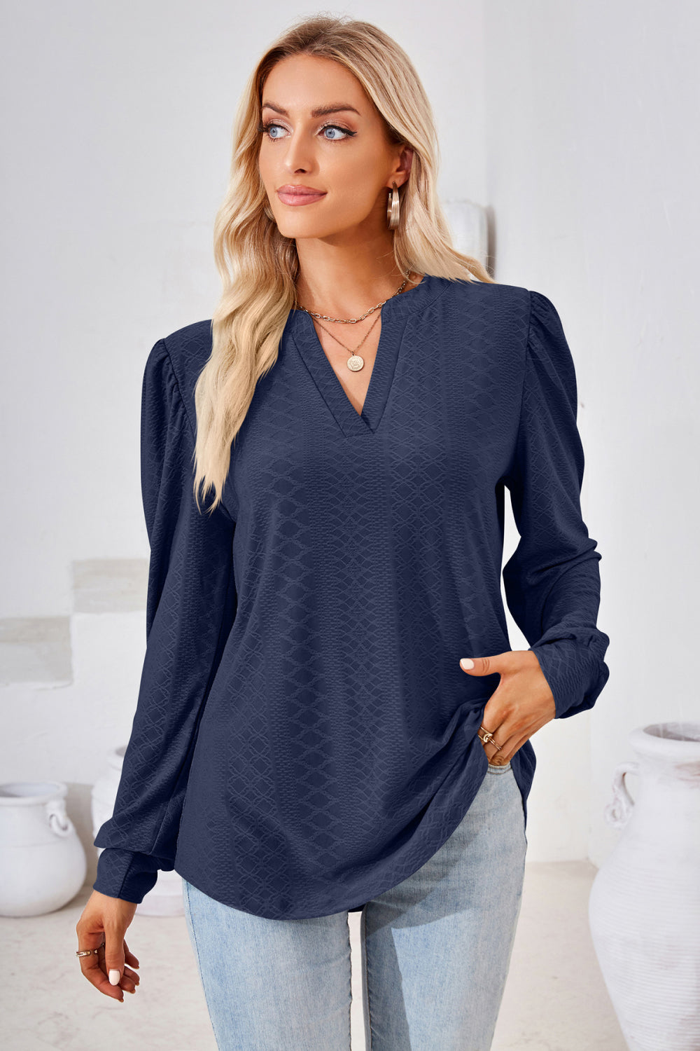 Textured knit split-neck puff sleeve blouse