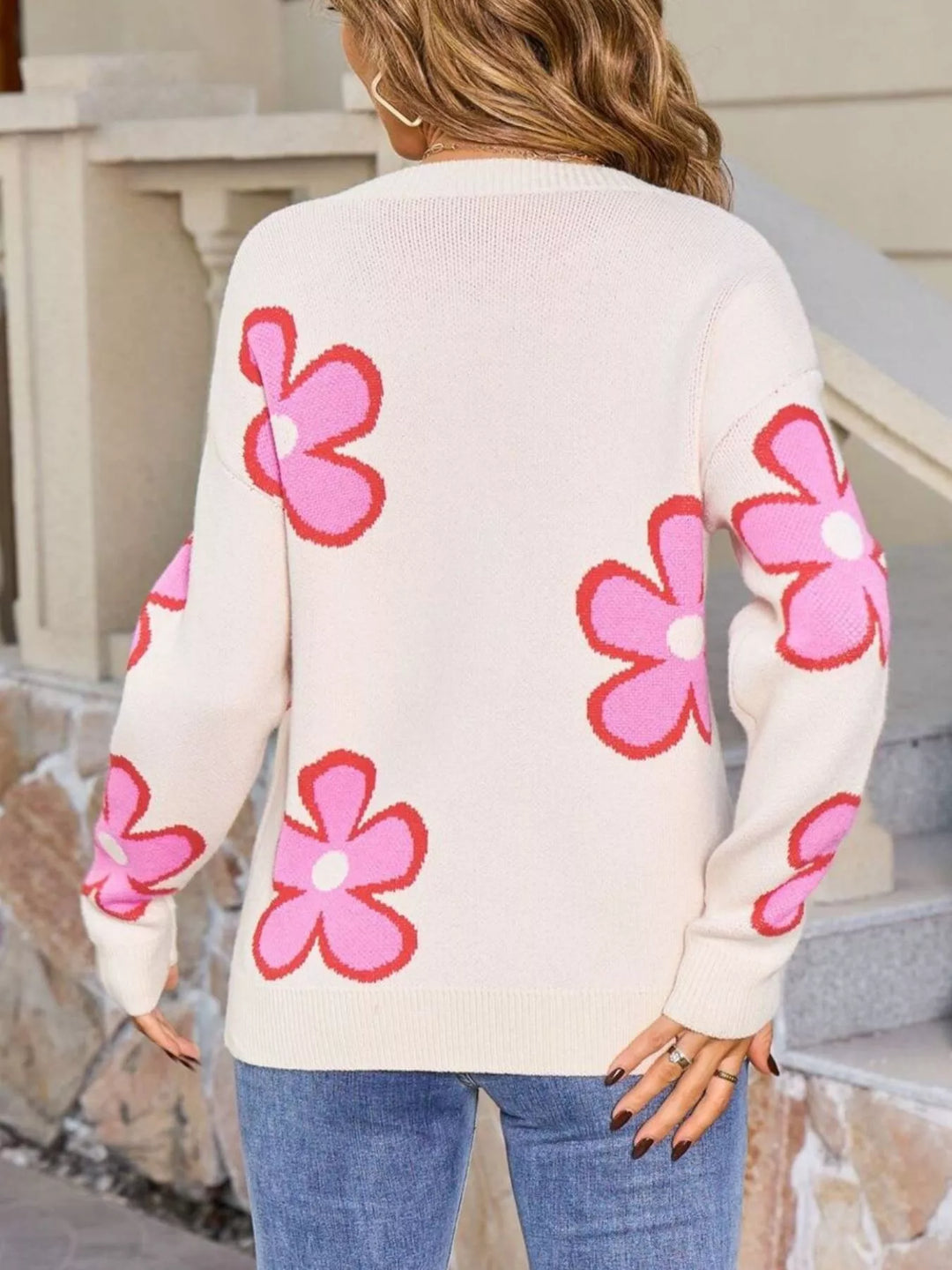 Floral crew neck knit sweater with ribbed cuffs