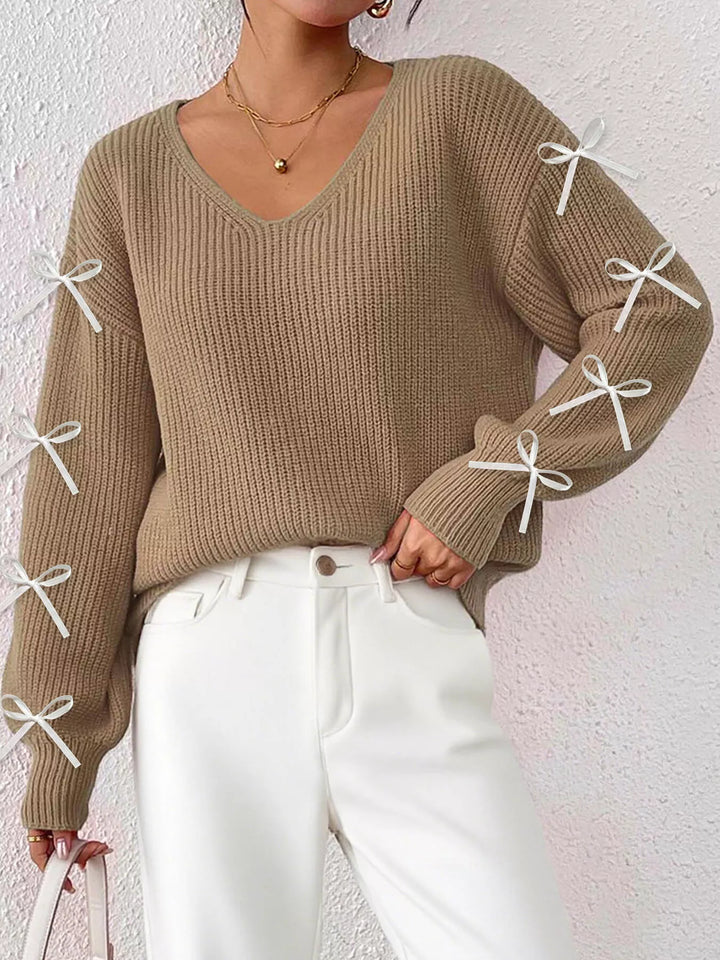Ribbed knit V-neck sweater with bow-tie sleeves