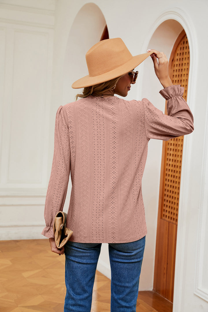 Eyelet V-neck blouse with flounce sleeves and lace trim