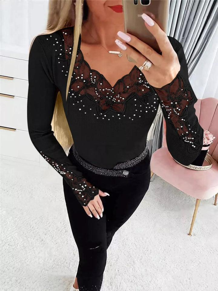 Black Ribbed knit top with floral lace trim and rhinestones