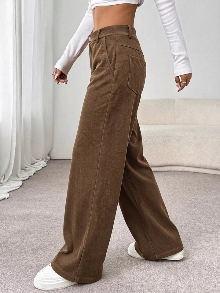 Wide-leg high-rise pants with button waist and deep pockets