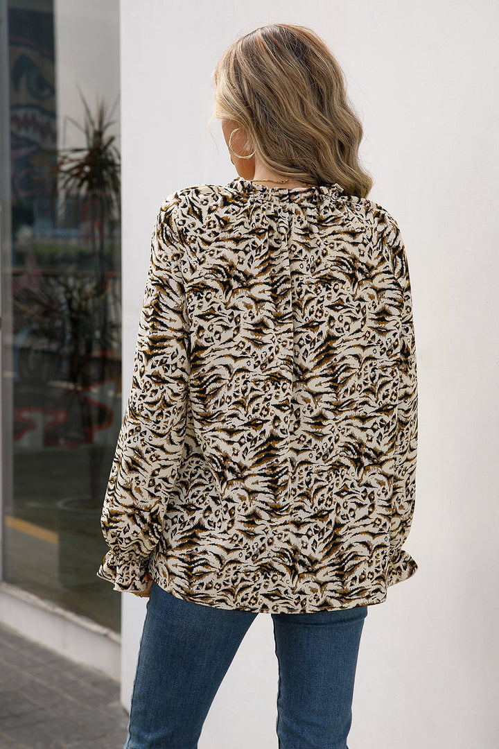 Animal print tie-neck blouse with flounce sleeves