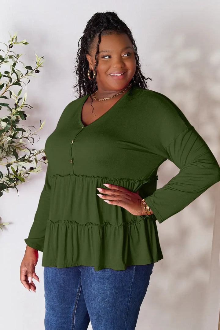 Half-button long sleeve blouse with tiered ruffle hem
