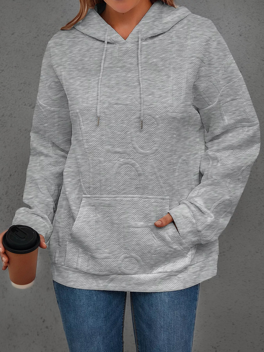 Textured embossed letter pullover hoodie with front pocket