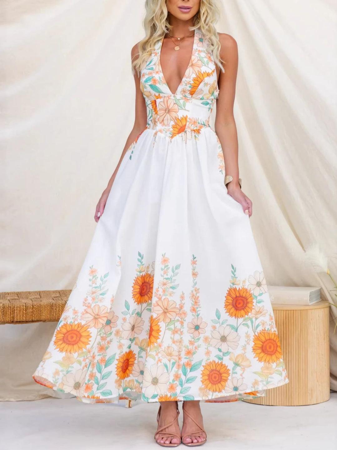 Sunflower print halter maxi dress with plunge neckline