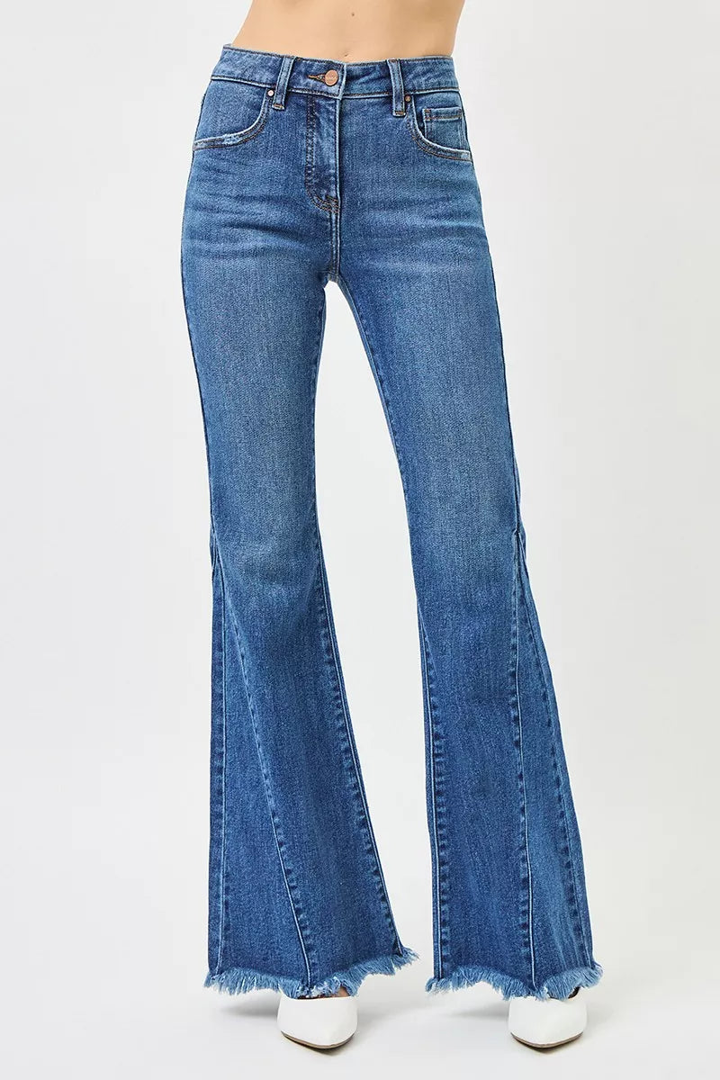 Mid-rise flare jeans with paneled side seams and raw hem