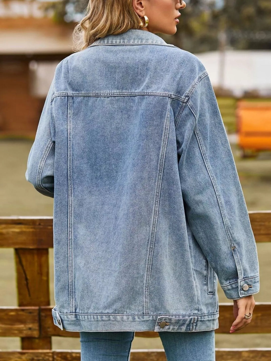 Oversized washed denim jacket with flap pockets